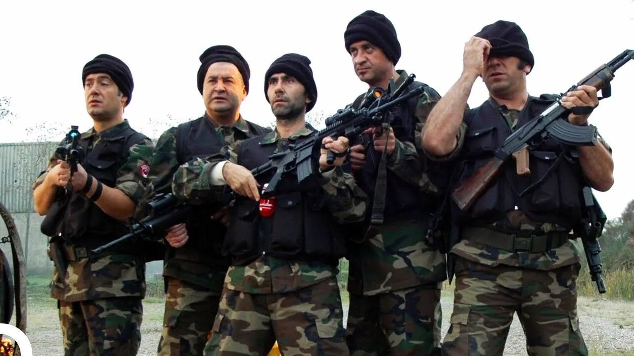 Backdrop for The Masked Gang: Iraq