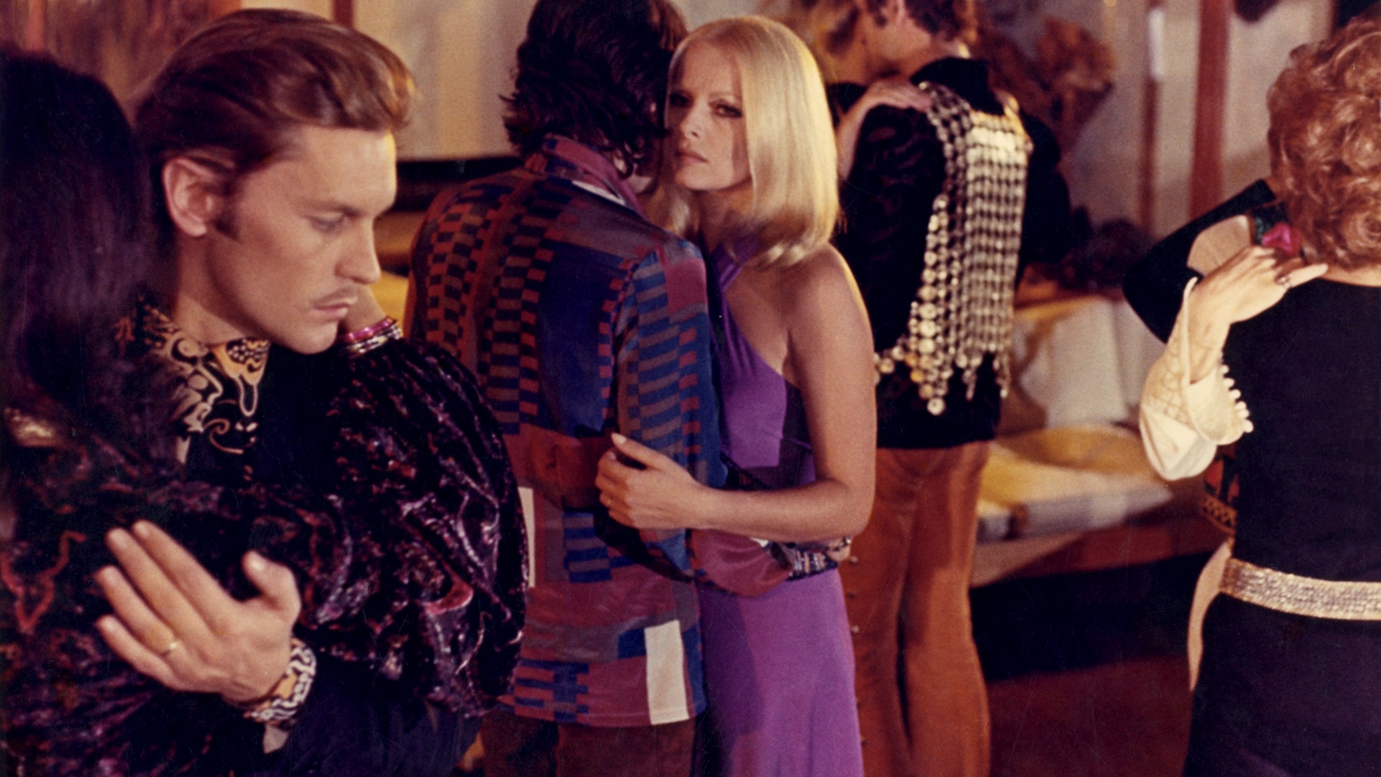 Backdrop for Love Me Strangely