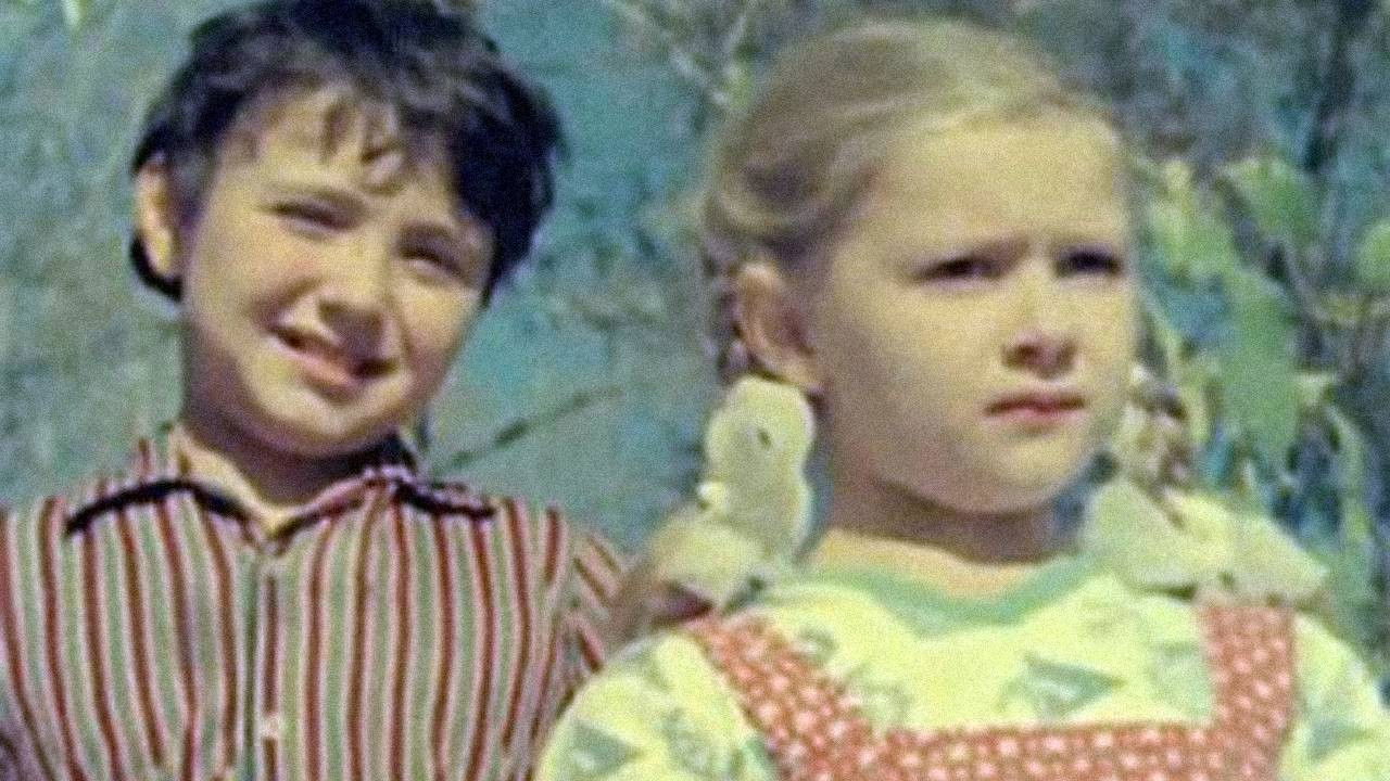 Backdrop for In the Village of "Riddlkino"