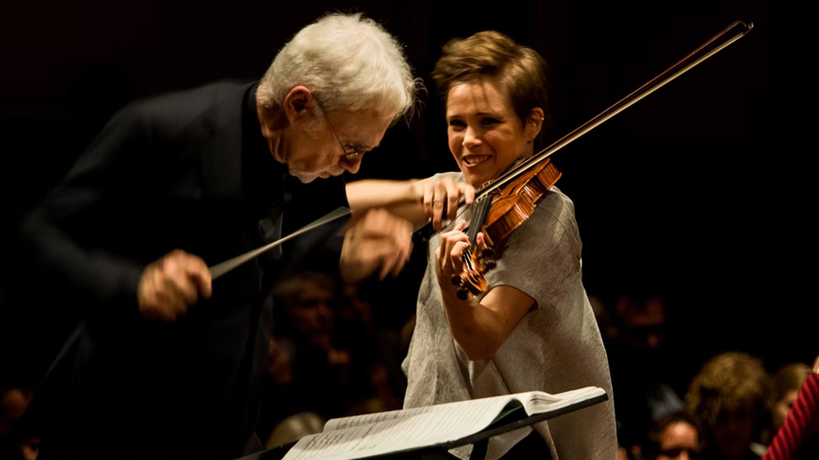 Backdrop for John Adams conducts John Adams