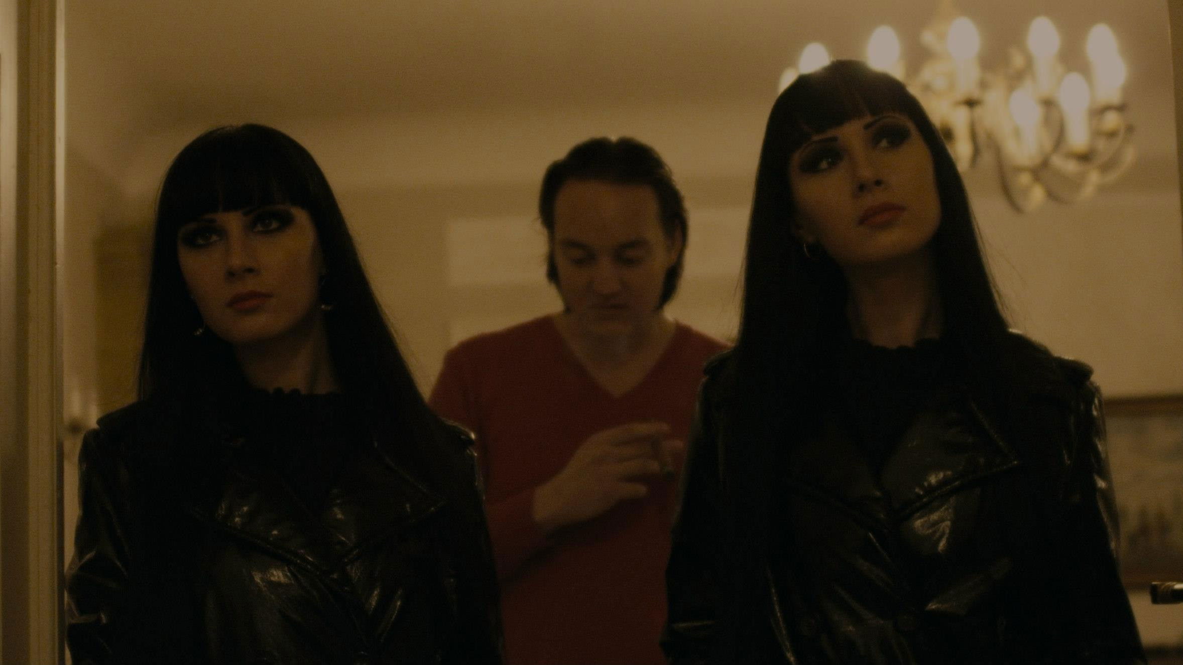 Backdrop for The Man in the Orange Jacket