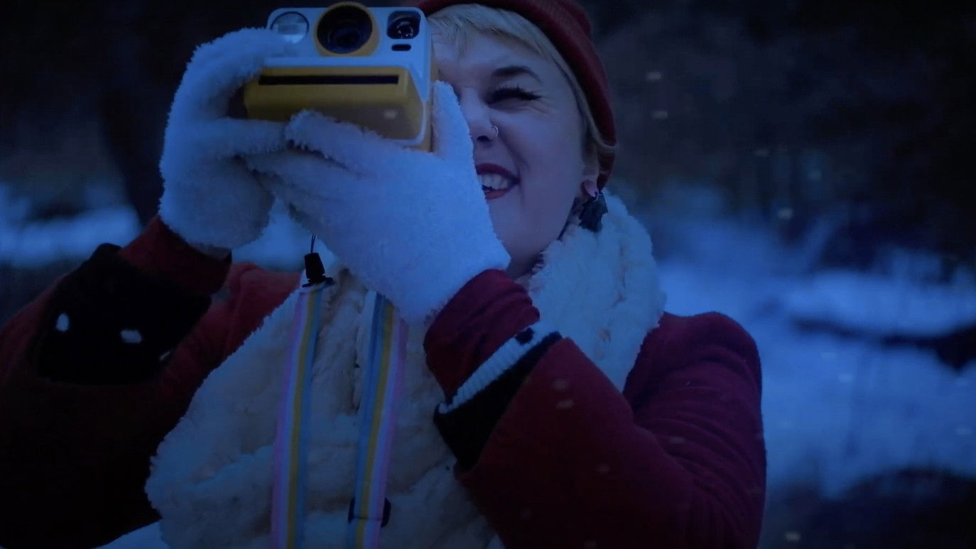 Backdrop for All I Want for Christmas is Mothman!