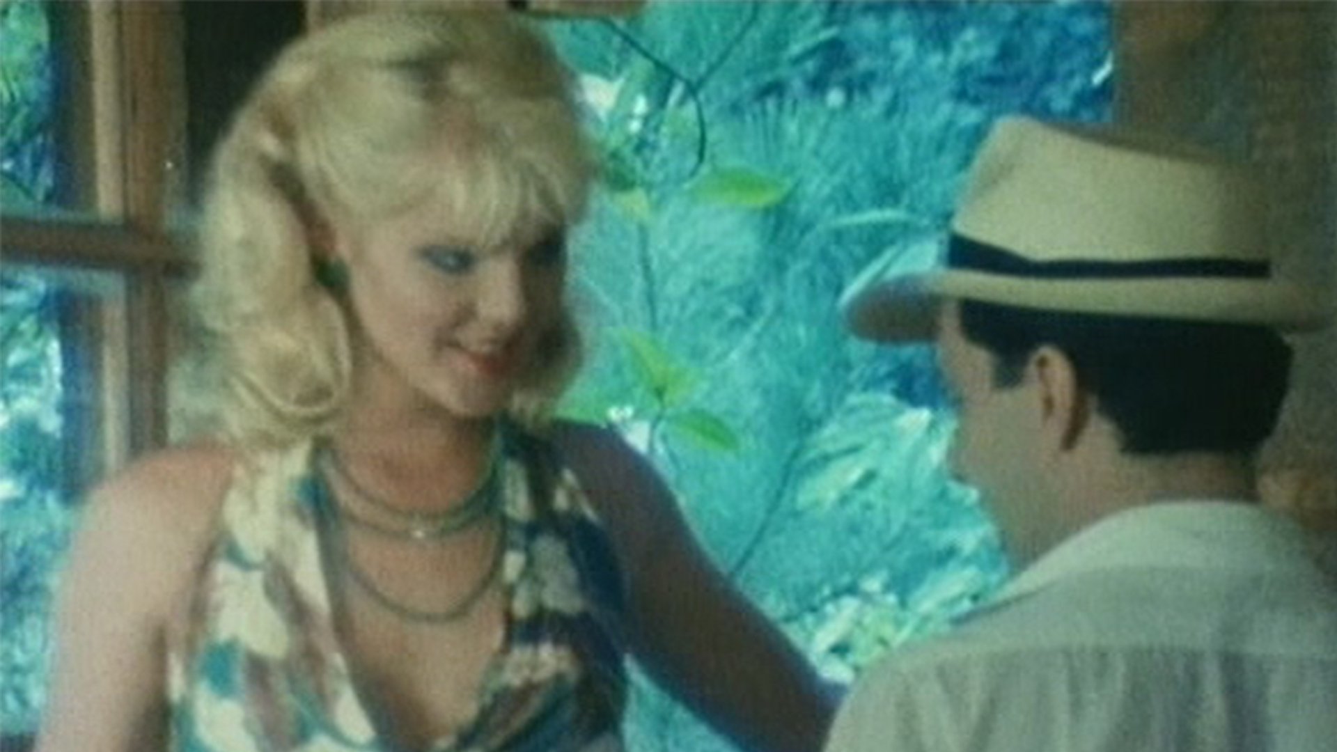 Backdrop for The Blonde Next Door