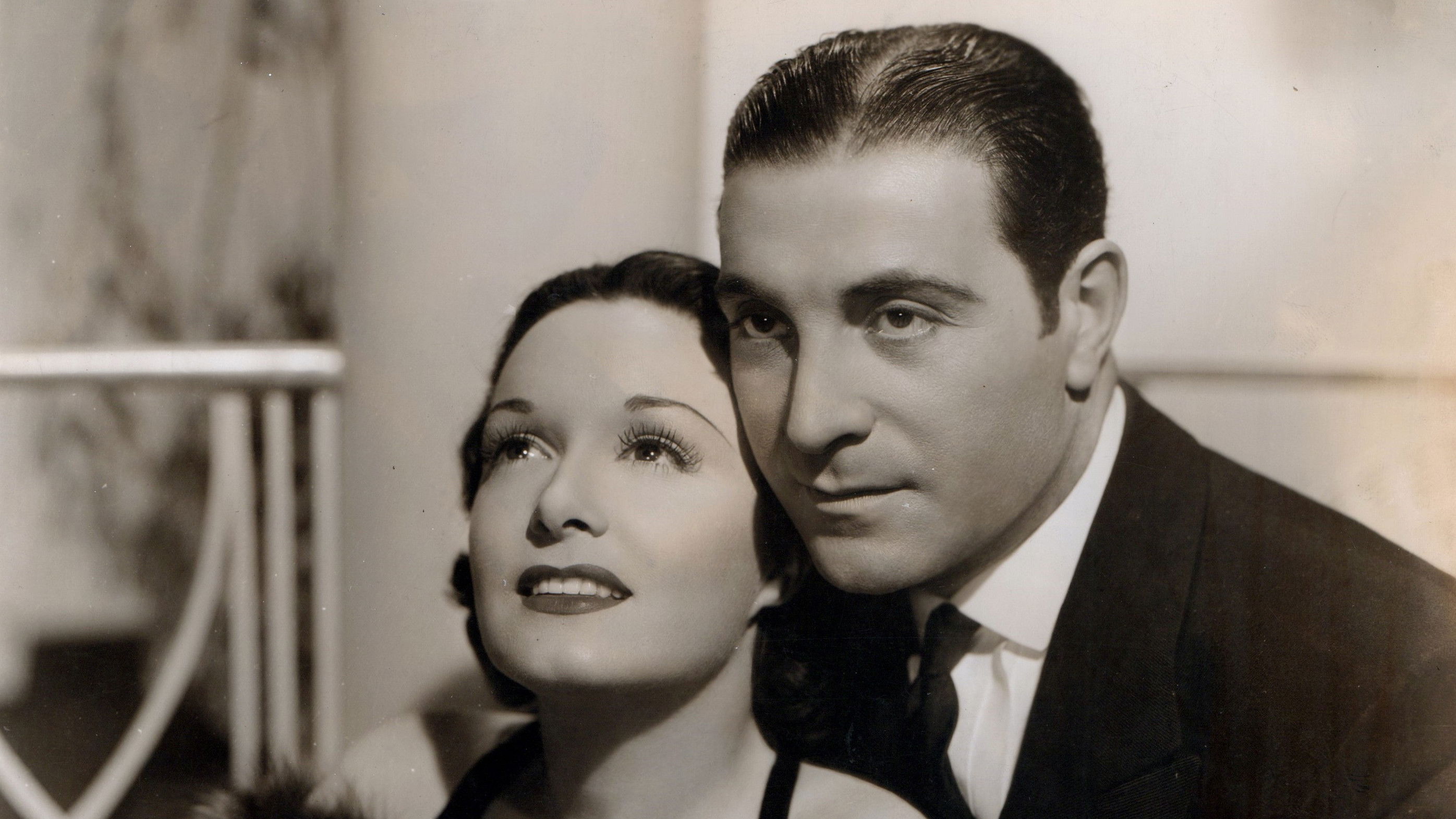 Backdrop for Her Husband Lies