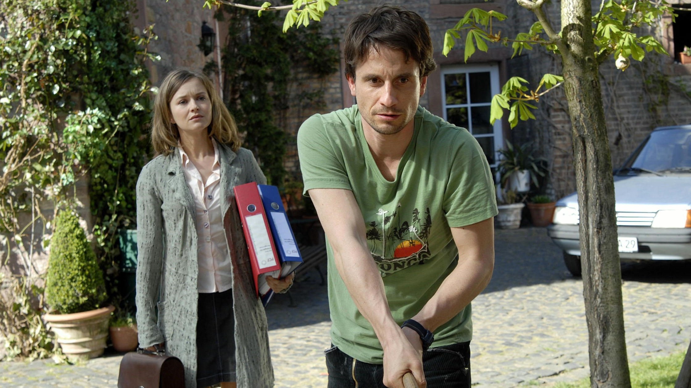 Backdrop for The Man at Her Side