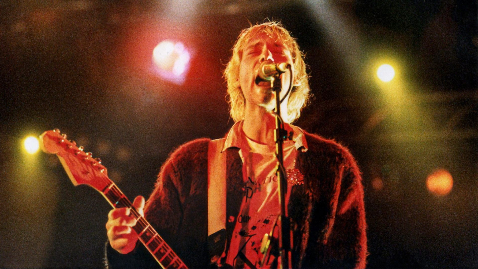 Backdrop for Kurt Cobain: Moments That Shook Music