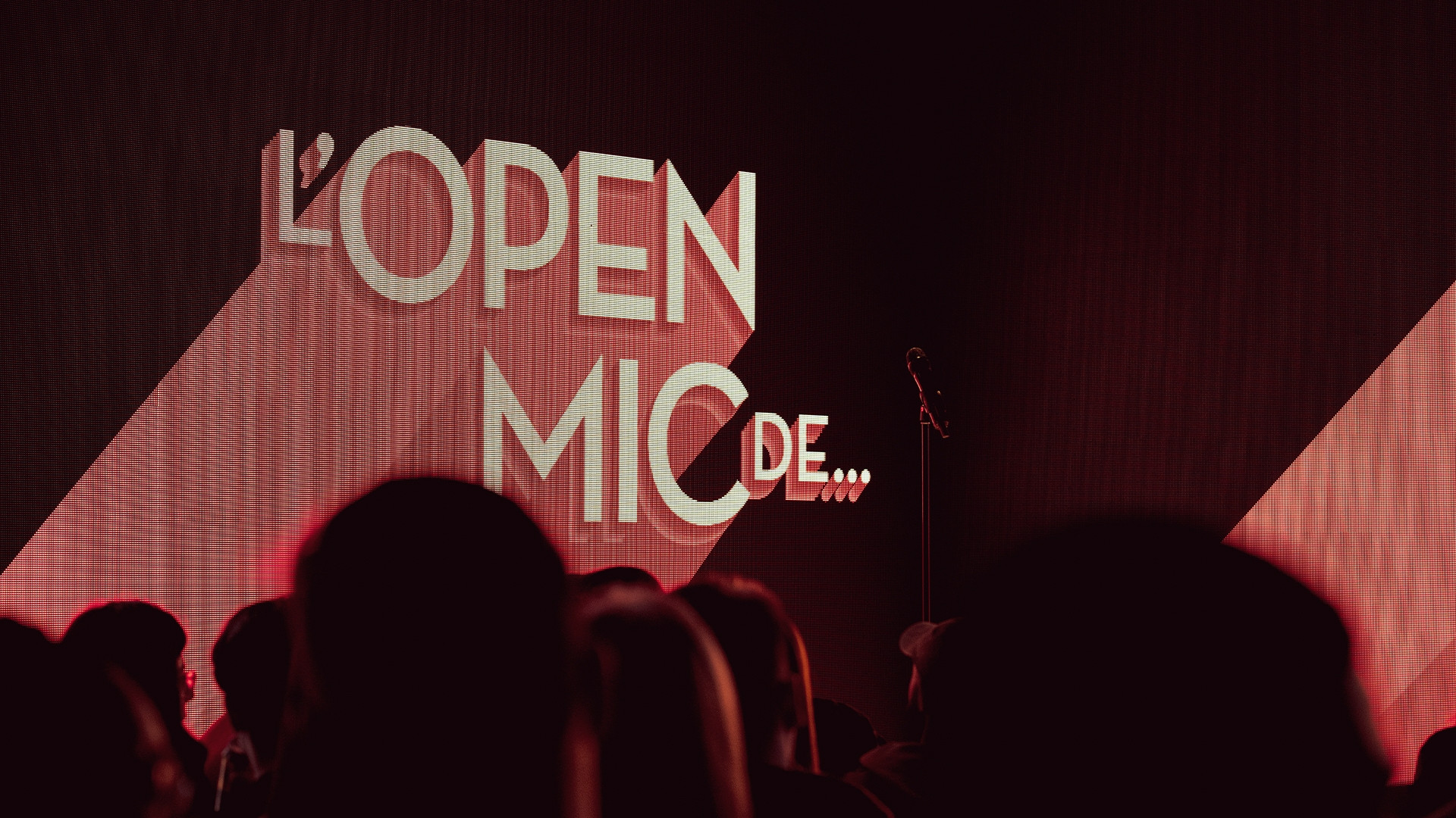 Backdrop for L'Open Mic de…