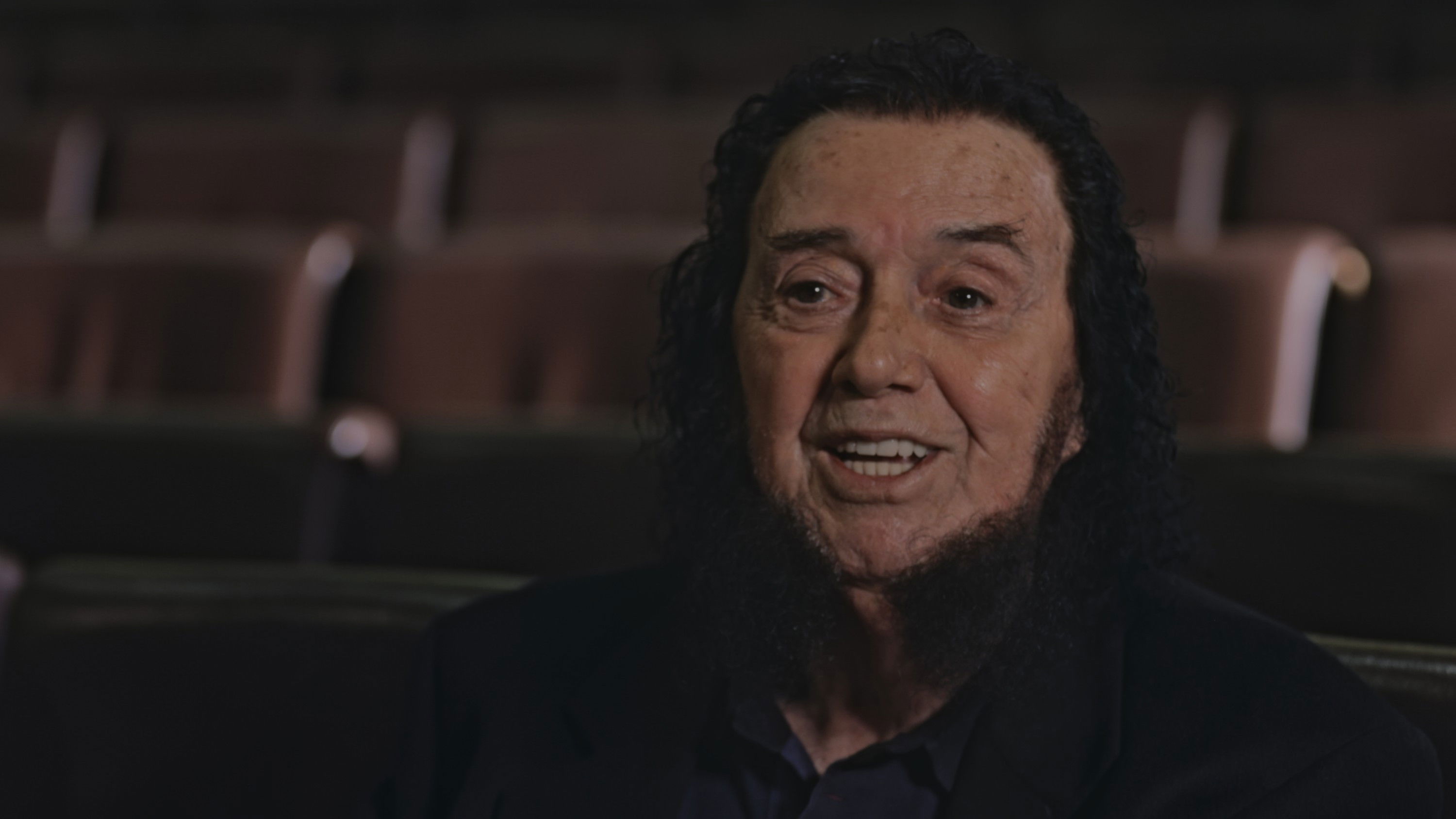 Backdrop for Yannis Spanos: Behind the marquee