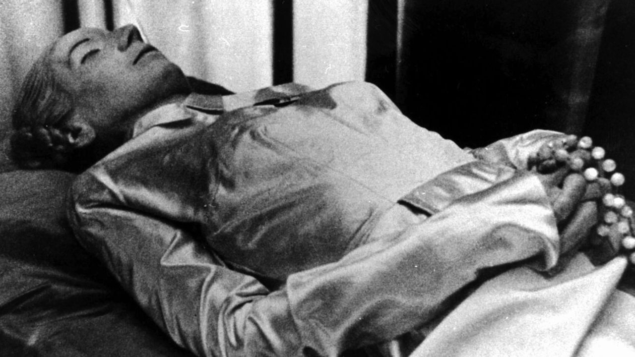 Backdrop for Evita: A Grave Without Peace