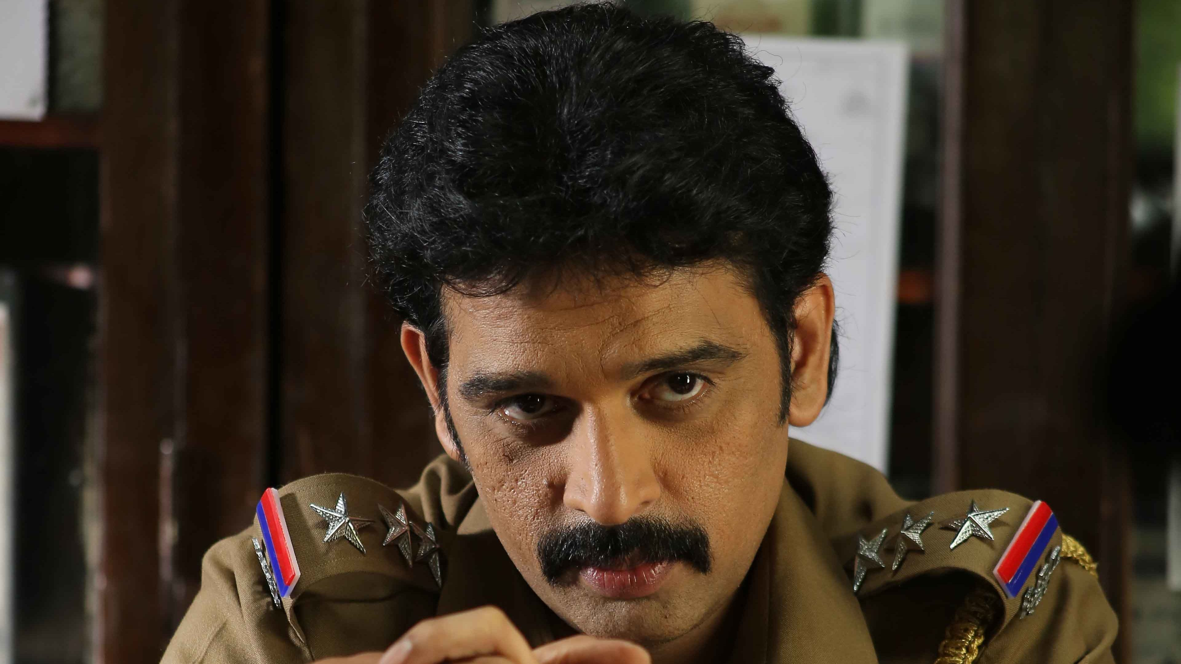 Backdrop for Marainthirunthu Paarkum Marmam Enna