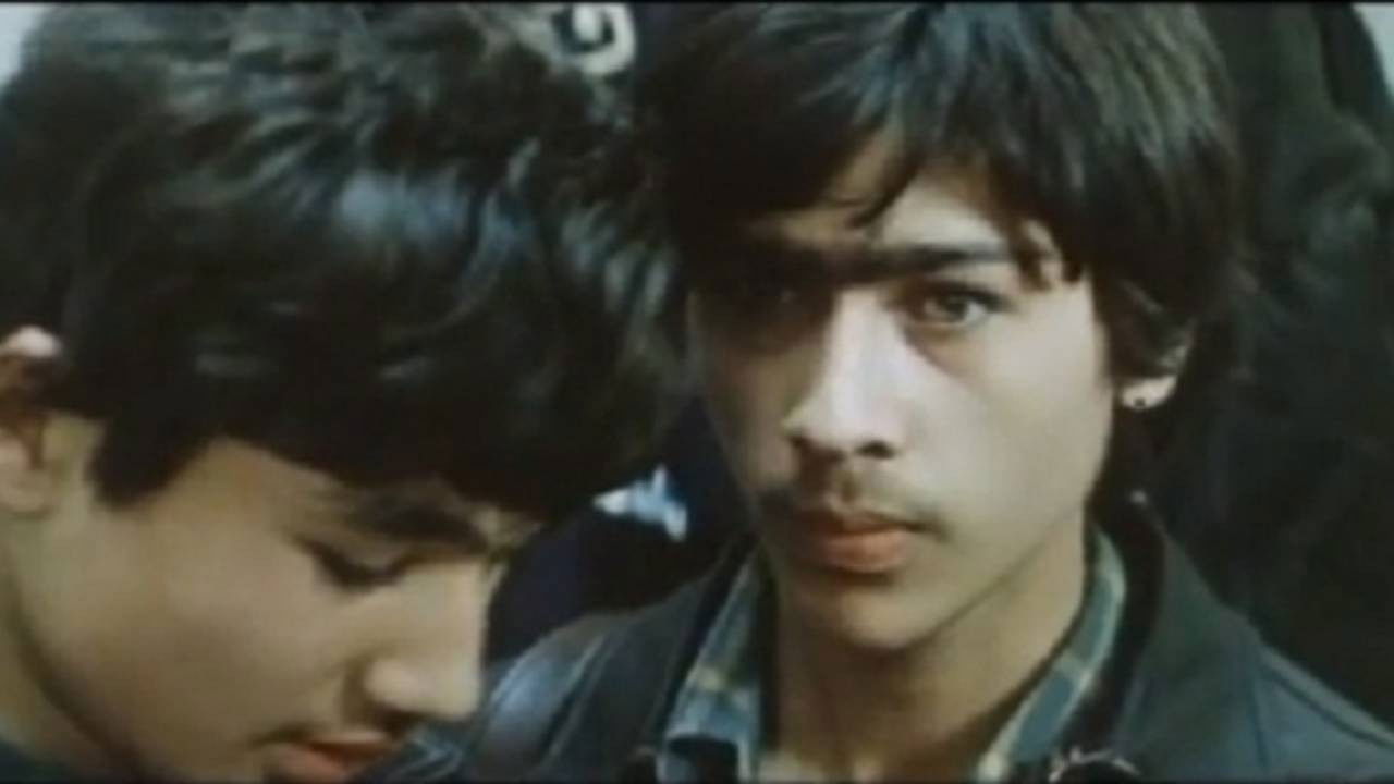 Backdrop for These Fearless Guys in Racing Cars