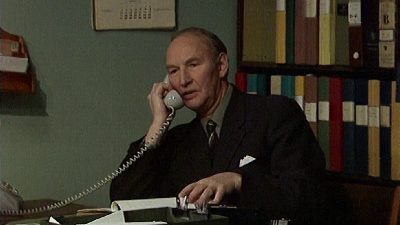 Backdrop for Den oersättlige