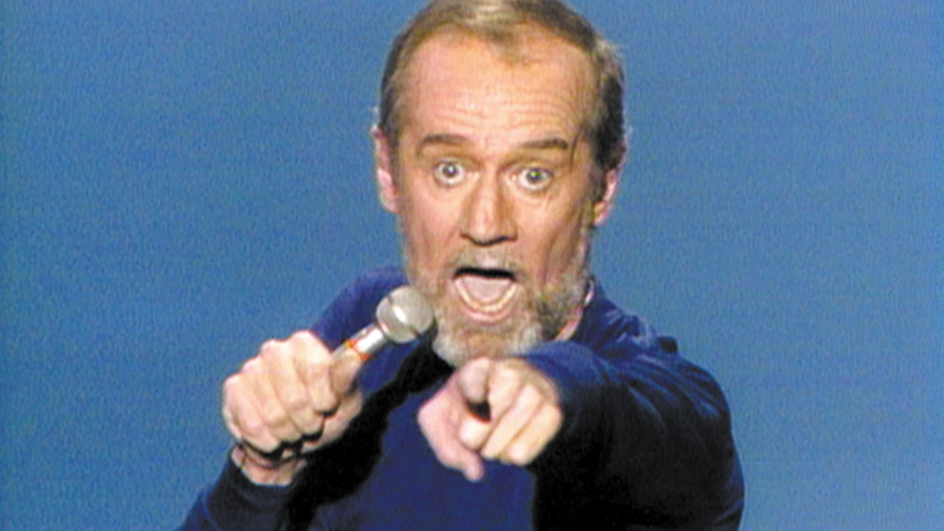 Backdrop for George Carlin: On Campus