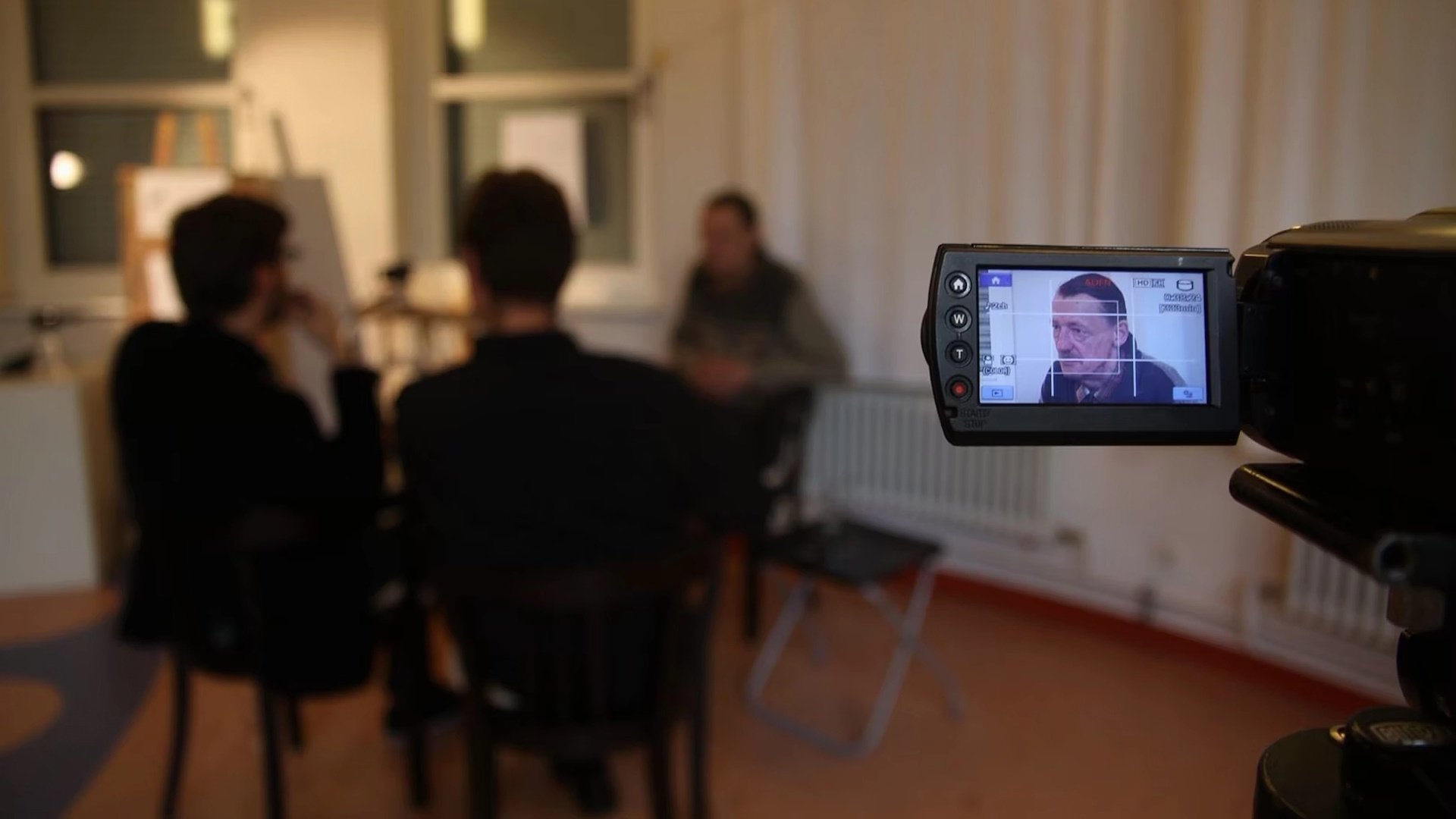 Backdrop for Ein Interview mit Dr. Axel Stoll. Der Film