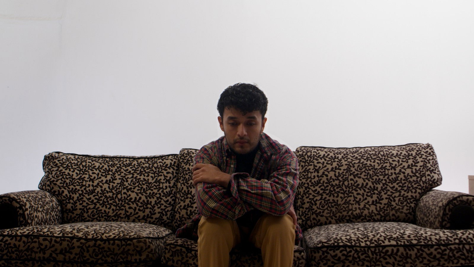 Backdrop for Si me quedo aquí