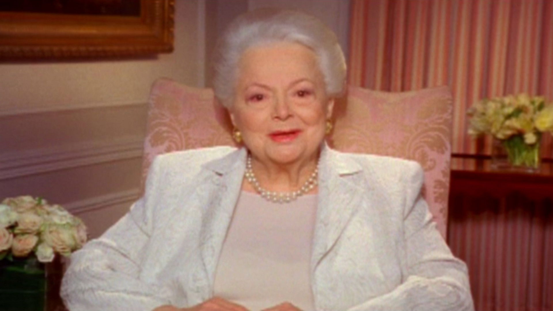 Backdrop for Melanie Remembers: Reflections by Olivia de Havilland