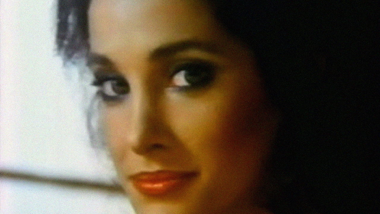 Backdrop for She's Dressed to Kill