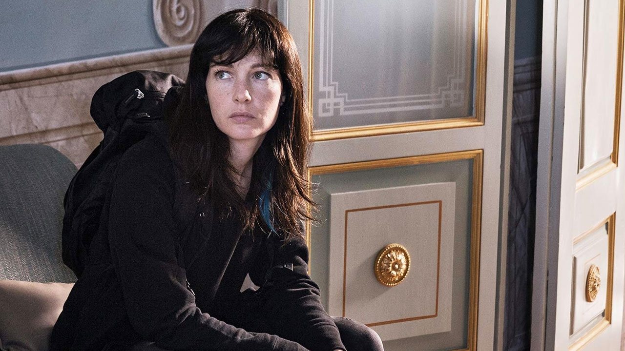 Backdrop for A Woman's Name