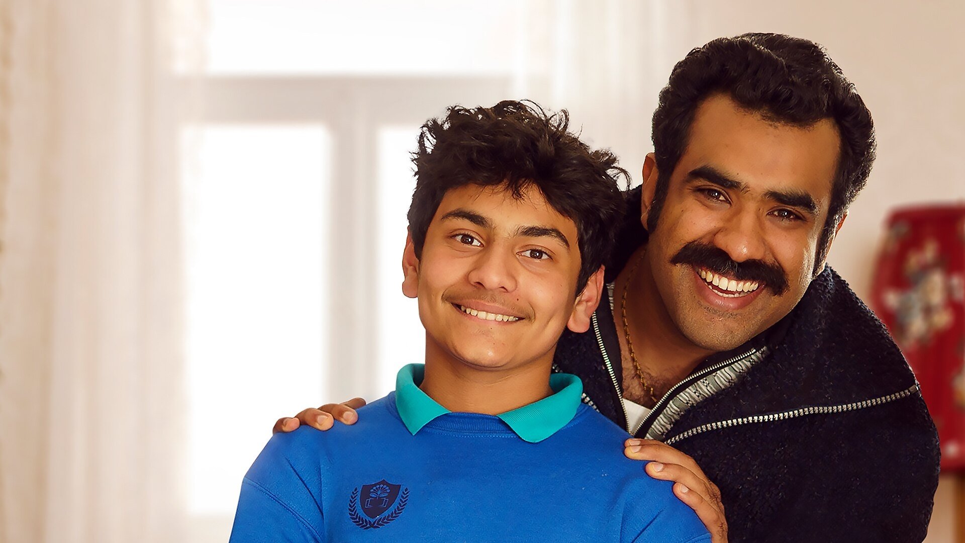 Backdrop for Raised by Refugees