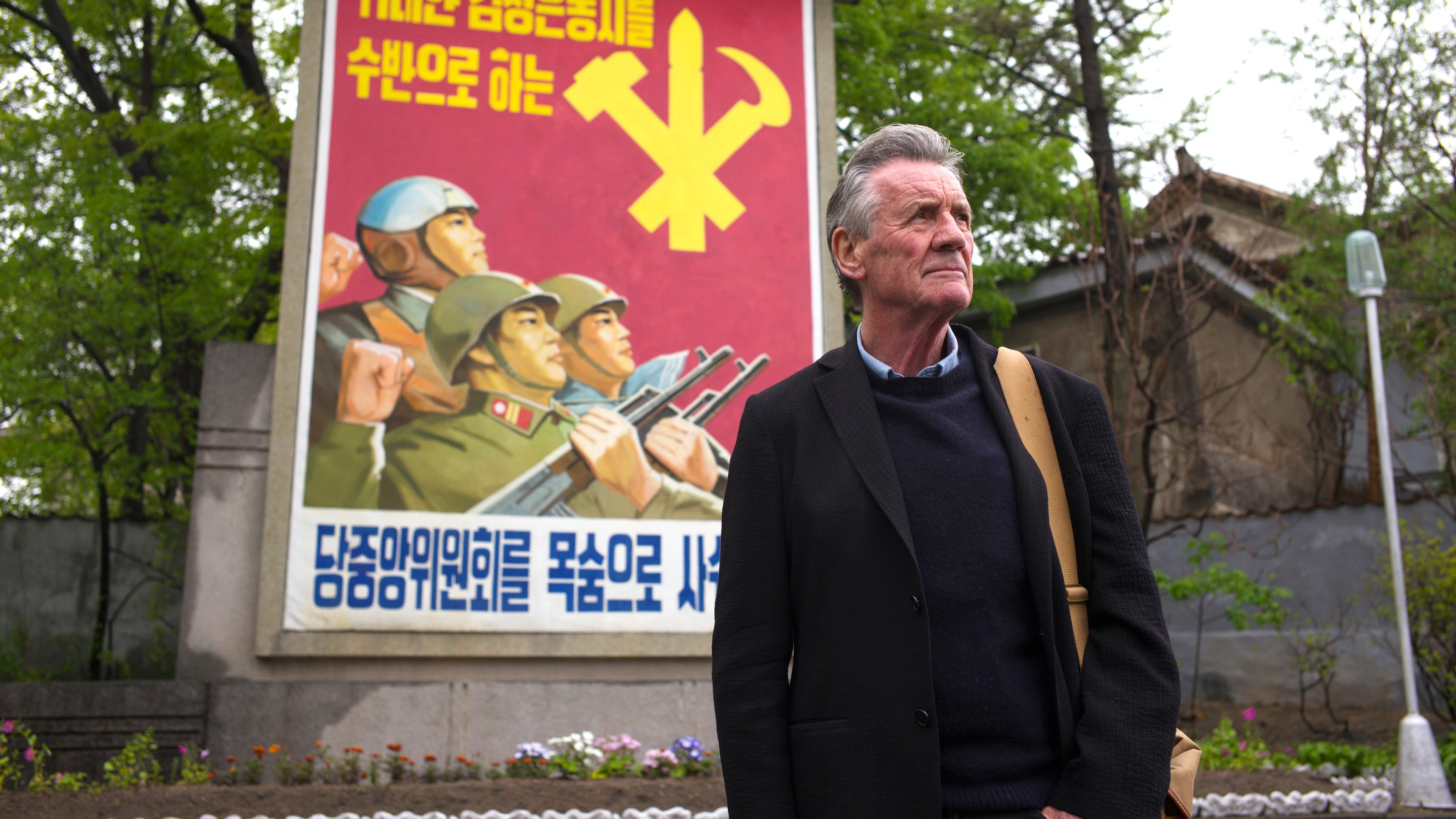 Backdrop for Michael Palin in North Korea