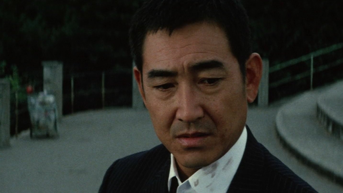 Backdrop for Japan's Violent Gangs: The Boss and the Killers