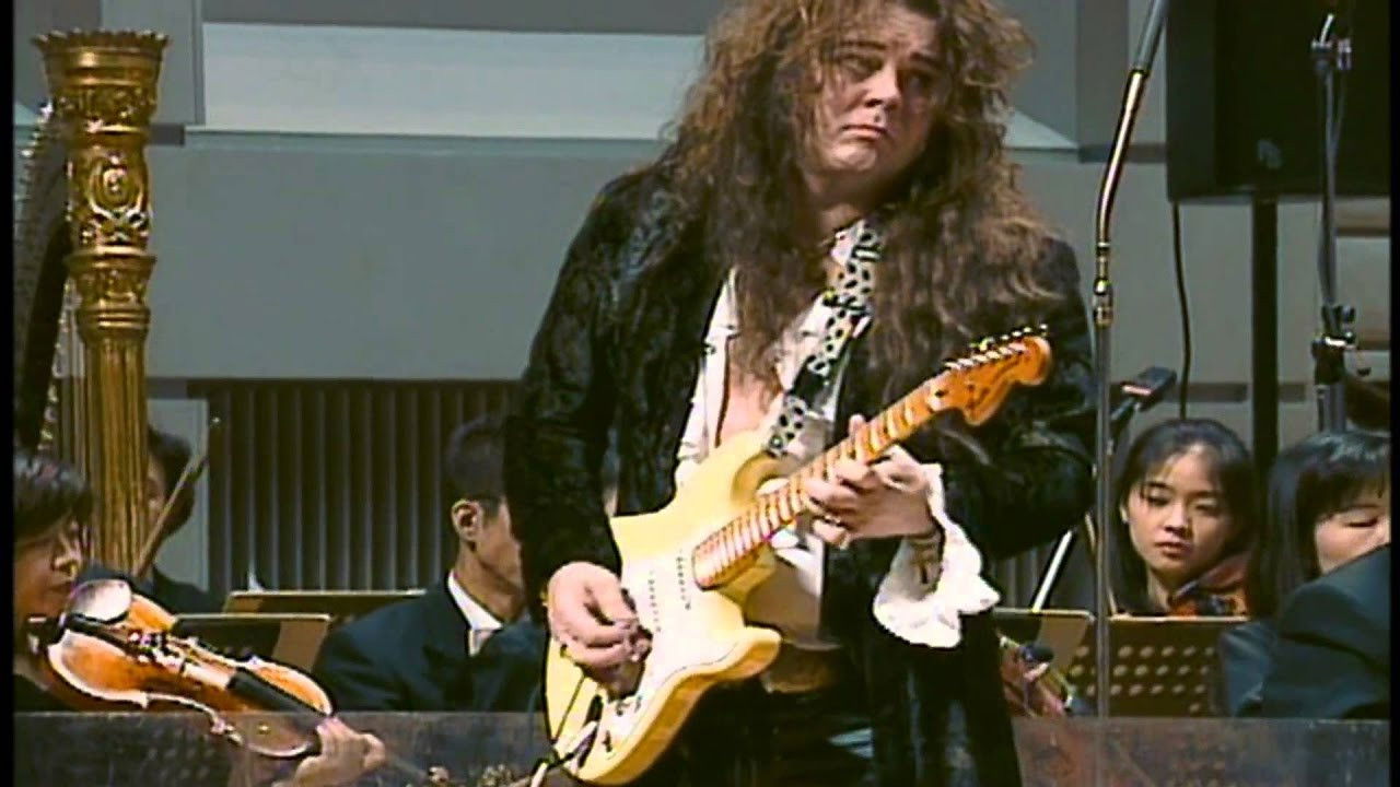Backdrop for Yngwie Malmsteen: Concerto Suite for Electric Guitar and Orchestra in E Flat Minor Op. 1