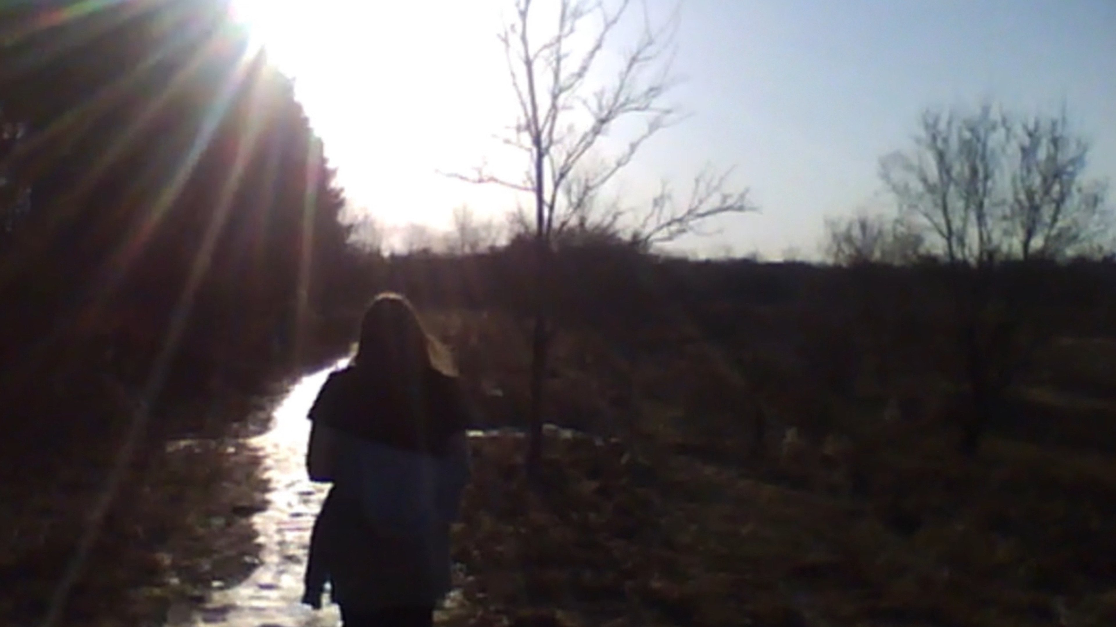 Backdrop for Man Filming Woman Filming Thing