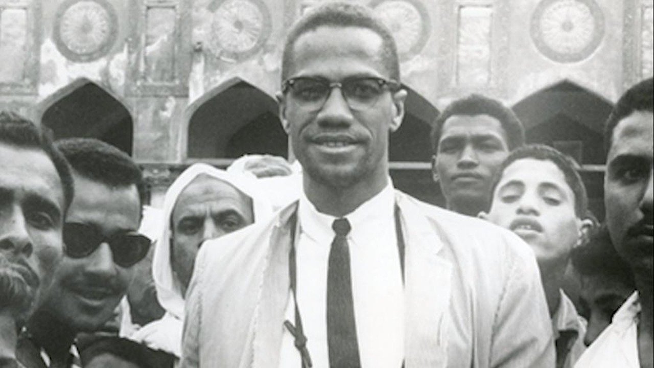 Backdrop for Malcolm X and the Sudanese
