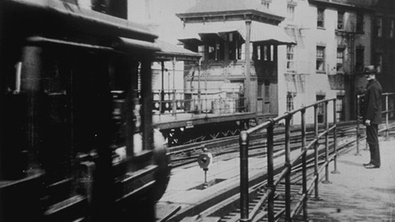 Backdrop for New York. Arrival of a Train at Battery Place