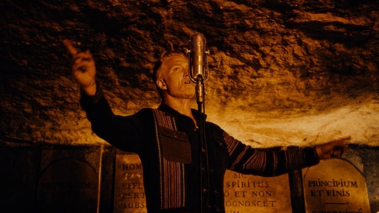 Backdrop for Queens of the Stone Age: Alive in the Catacombs