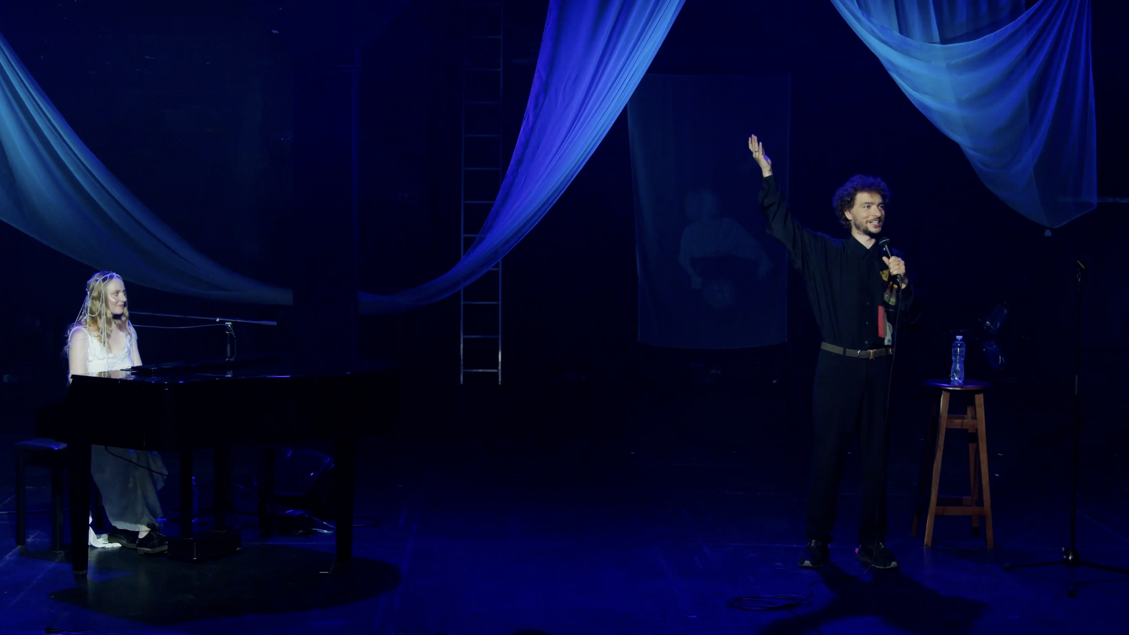 Backdrop for parrot, death, and a piano