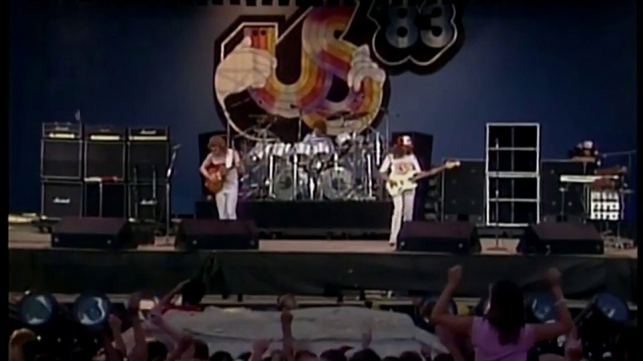 Backdrop for Triumph: Live at the US Festival
