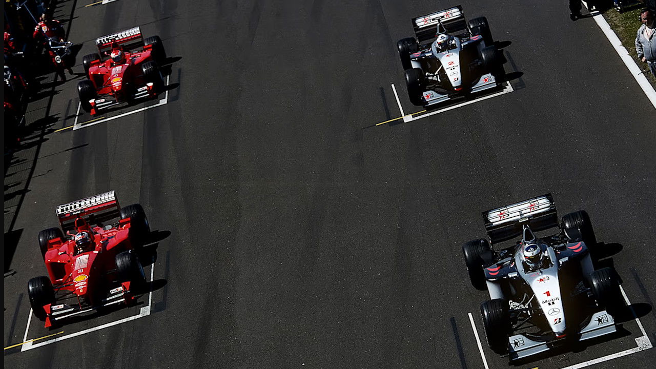 Backdrop for The Champion On The Track: The Official Review Of The 1999 FIA Formula One World Championship