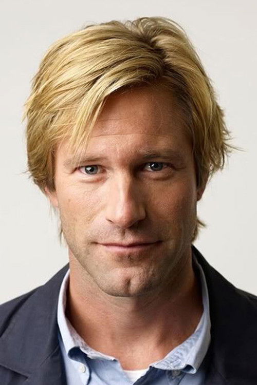 Photo of Aaron Eckhart