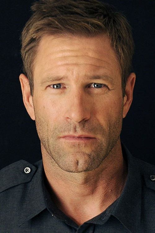 Photo of Aaron Eckhart