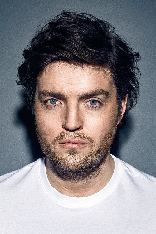 Photo of Tom Burke