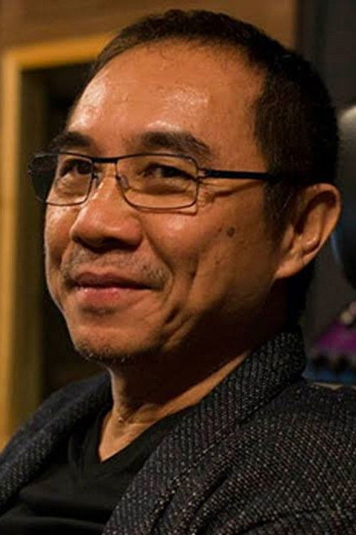 Photo of Thaneth Warakulnukroh