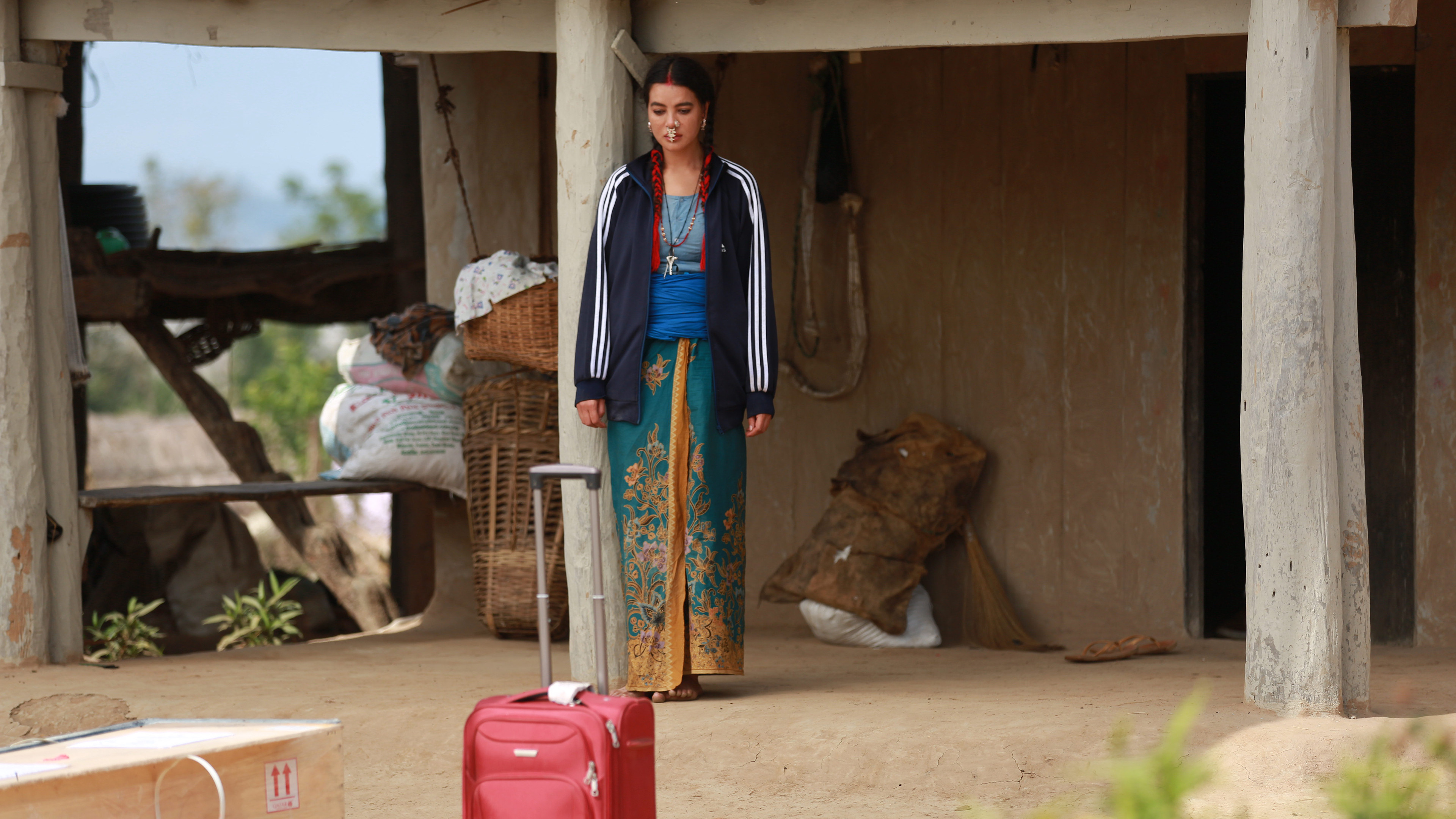 Backdrop for The Red Suitcase