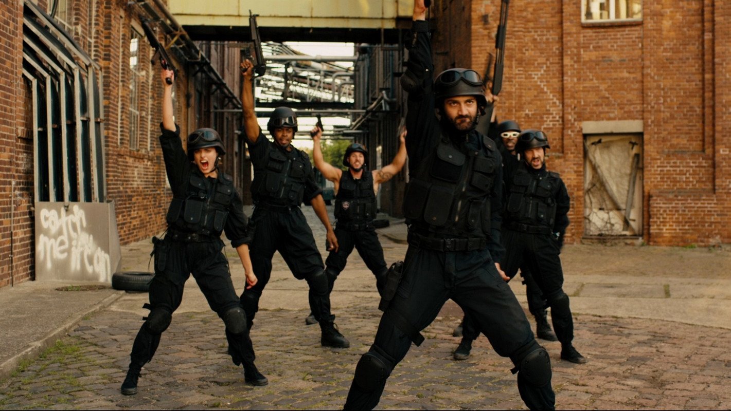 Backdrop for Hard Way: The Action Musical