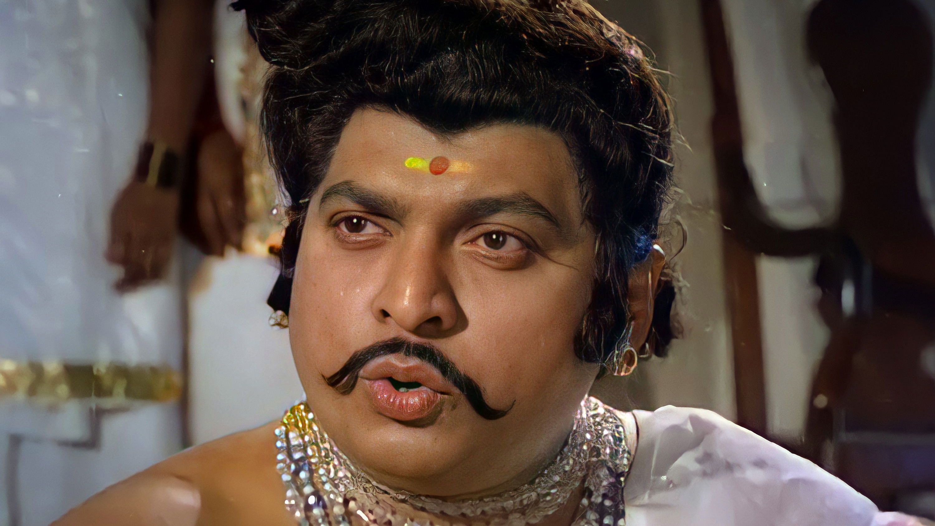 Backdrop for Kadathanaattu Maakkam